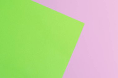 Yumuşak pembe ve yeşil kağıt doku arka plan olarak. En az kavramı. Yaratıcı kavramı. Pop Art. Parlak tatlı moda stil.