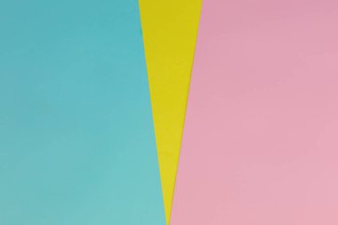Kağıt mavi, yumuşak pembe ve sarı renkli arka plan doku. Düz yatıyordu. En az kavramı. Yaratıcı kavramı. Sıcak yaz Vibes. Pop Art. . Parlak tatlı moda stil.