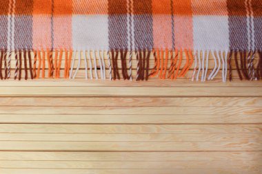 Turuncu ekose bir ahşap sonbahar arka plan bir kafeste. Sonbahar kavramı. Sonbahar zaman