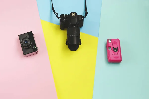 Fashion Film Camera. Minimal Creative style with colorful paper backdrop Pastel Sweet Style. Flat lay. top view. Copy space.