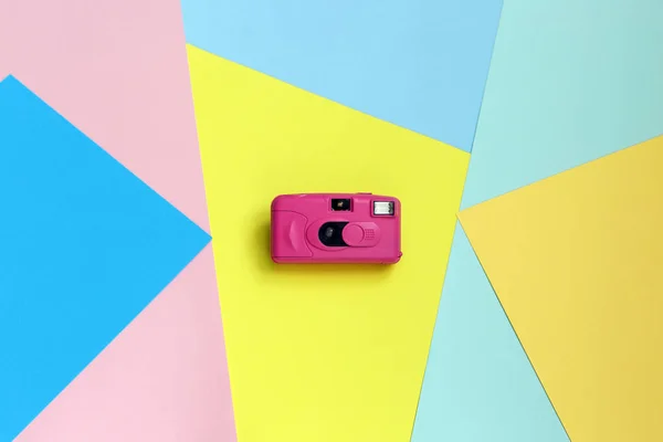 Fashion Film Camera. Minimal Creative style with colorful paper backdrop Pastel Sweet Style. Flat lay. top view. Copy space.