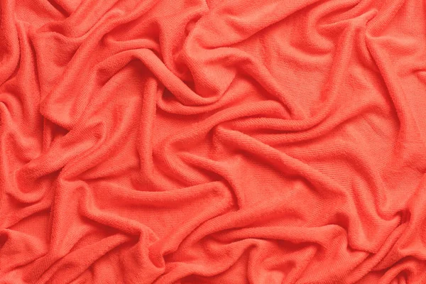 Sfondo in tessuto moderno o modellare con spazio per il testo. Texture di stoffa in colore corallo dell'anno 2019 — Foto Stock
