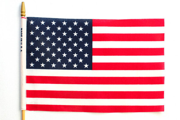 United States of America flag hanging on white background