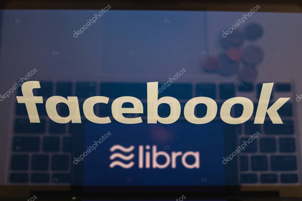 CHIANG MAI,THAILAND - JULY 17,2019: Facebook and Libra cryptocurrency logo on macbook screen. Libra will only be available in the Facebook messenger app.