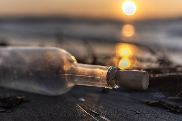 Bottles and objects by the sea