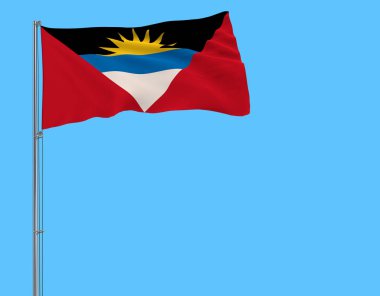 Antigua ve Barbuda bayrağı mavi arka plan, 3d render rüzgarla içinde çırpınan bir bayrak direği üzerinde izole