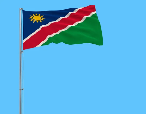 Флаг Намибии Флагштоке Развевающемся Ветру Чистом Голубом Фоне Рендеринг — стоковое фото