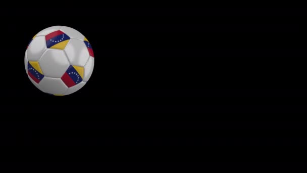 Soccer Ball met vlag van Venezuela vliegt voorbij camera, Slow Motion, alfakanaal — Stockvideo