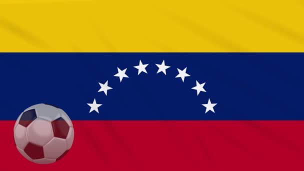 Bandera de Venezuela y pelota de fútbol gira contra telón de fondo de tela ondulante — Vídeos de Stock