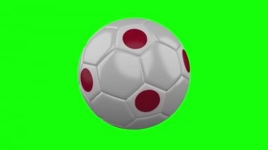 Yeşil renk anahtar arka plan, döngü üzerinde Japonya bayrağı ile Futbol topu
