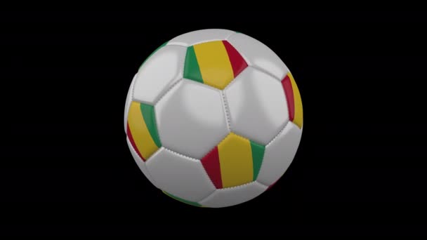 Balón de fútbol con bandera Guinea bucle 4k con alfa — Vídeo de stock