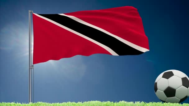 Bandera de Trinidad y Tobago ondeando y rollos de fútbol — Vídeos de Stock