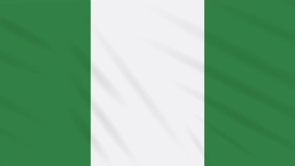 Флаг Нигерии размахивая тканью, фоновая петля — стоковое видео