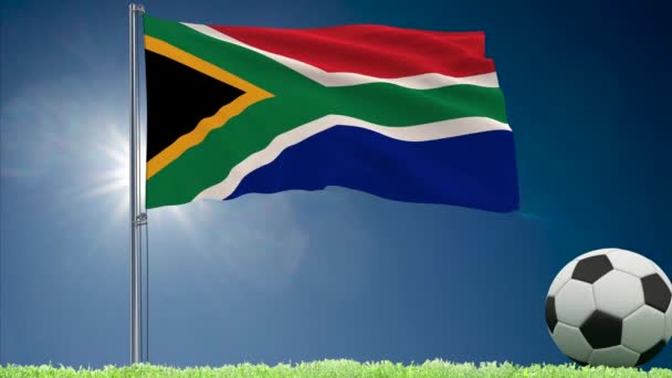 South Africa flag fluttering and football rolls — Stock Video