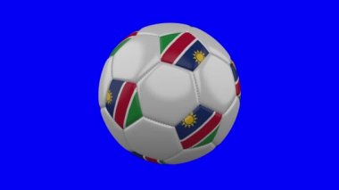 Mavi renk anahtar arka plan, döngü Üzerinde Namibya bayrağı ile Futbol topu
