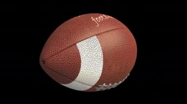 Amerikan futbol topu uçan ve dönen, 4k alfa döngü