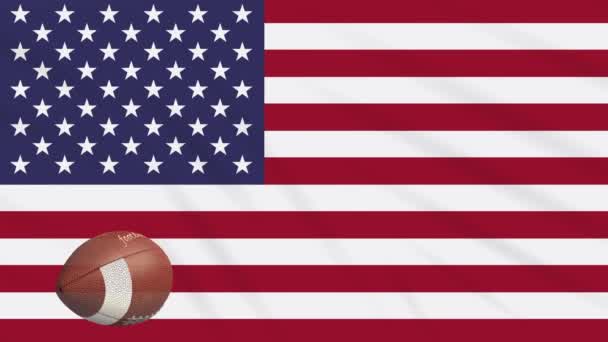 US-Flagge schwenkt und American Football Ball dreht sich, Schleife — Stockvideo