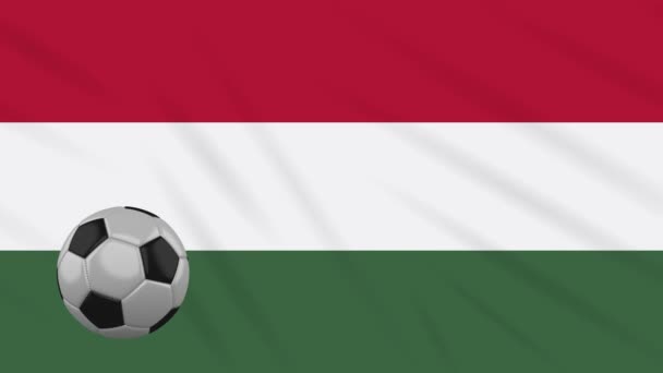 Hungría bandera ondeando y el fútbol gira, bucle — Vídeo de stock