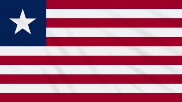 Liberia flagga viftande trasa bakgrund, loop — Stockvideo
