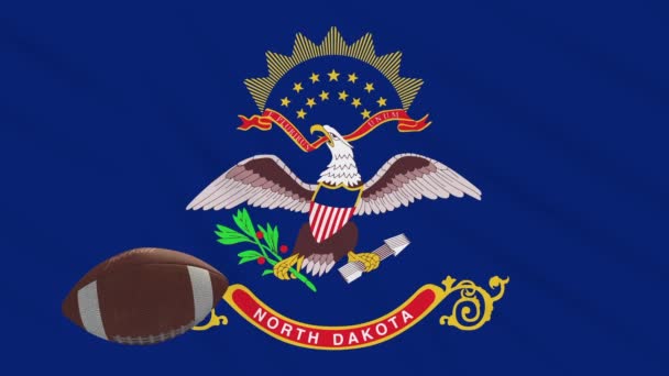 North Dakota flag waving and american football ball rotates, loop — Stock Video