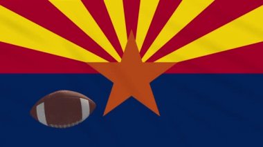 Arizona bayrağı sallanıyor ve Amerikan futbol topu dönüyor, dönüyor