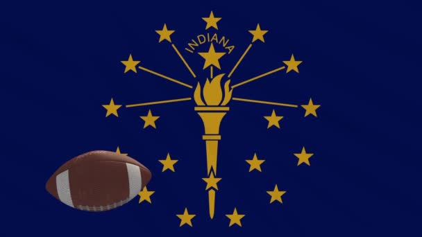 Bandeira de Indiana acenando e bola de futebol americano gira, loop — Vídeo de Stock