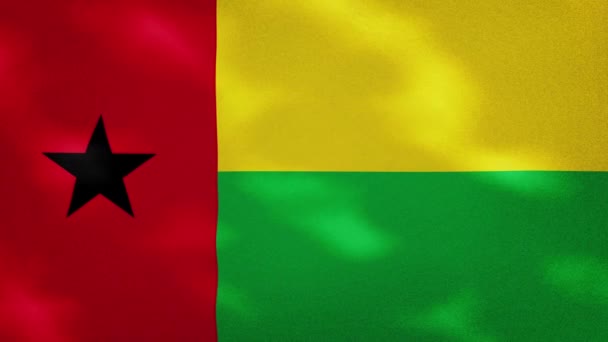 Guinea Bissau hustá vlajková tkanina vlnky, pozadí smyčka — Stock video