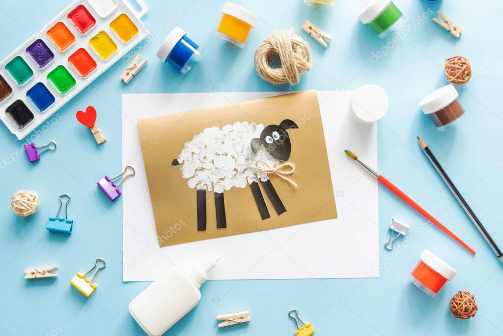 6 Diy Eid al adha lamb sheep baby craft on blue background. Gift idea, decor Eid al adha. Step by step. Top view. Process kid children craft.