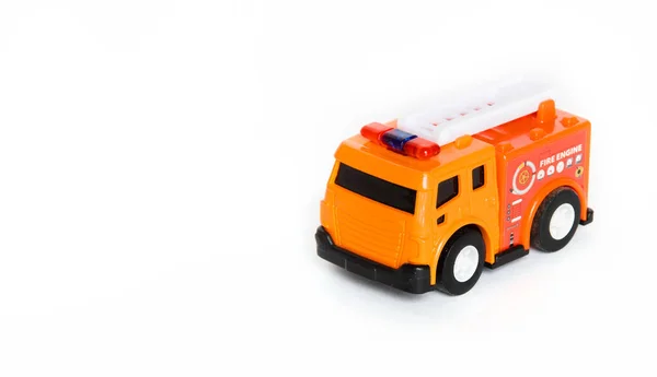 Κόκκινο Παιχνίδι Κινητήρα Φωτιά Απομονώνονται Λευκό Φόντο Παιχνίδι Πυροσβεστικού Οχήματος — Φωτογραφία Αρχείου
