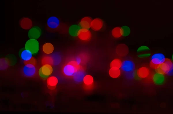 Multicolored lights in blur. New year. Chrismas. Concert