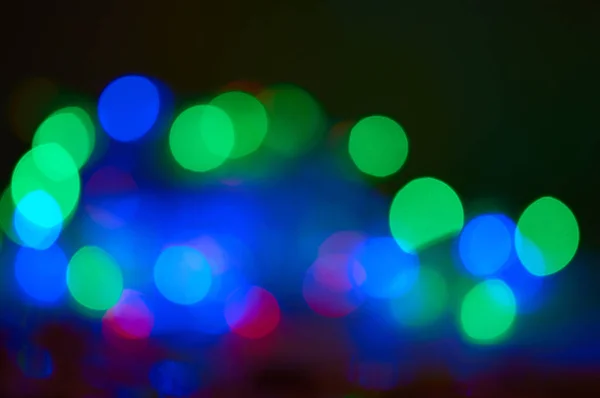 Multicolored lights in blur. New year. Chrismas. Concert