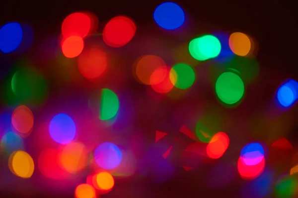 Multicolored lights in blur. New year. Chrismas. Concert