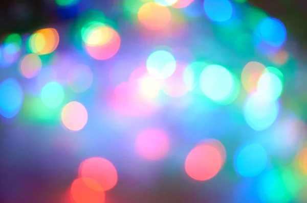 Multicolored lights in blur. New year. Chrismas. Concert