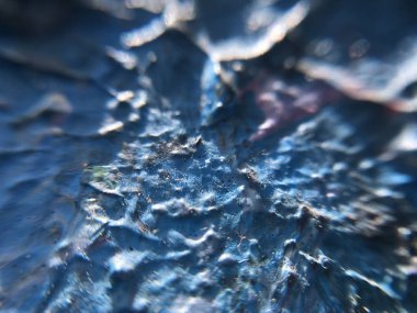 Indigo derin evrenin karanlık gece. Koyu mavi arka plan ile doğal indigo boya dokular. Parlak işaretler, afiş ve diğer tasarım çalışmaları için şaşırtıcı her gece zemin.