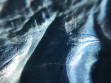 Indigo derin evrenin karanlık gece. Koyu mavi arka plan ile doğal indigo boya dokular. Parlak işaretler, afiş ve diğer tasarım çalışmaları için şaşırtıcı her gece zemin.