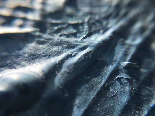 Indigo derin evrenin karanlık gece. Koyu mavi arka plan ile doğal indigo boya dokular. Parlak işaretler, afiş ve diğer tasarım çalışmaları için şaşırtıcı her gece zemin.