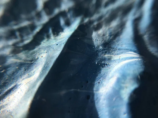 Indigo derin evrenin karanlık gece. Koyu mavi arka plan ile doğal indigo boya dokular. Parlak işaretler, afiş ve diğer tasarım çalışmaları için şaşırtıcı her gece zemin.