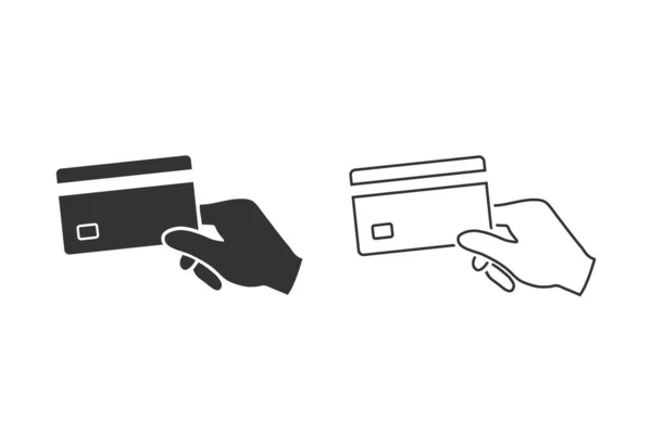 Mano sosteniendo un icono de línea de tarjeta de crédito. Vector — Vector de stock