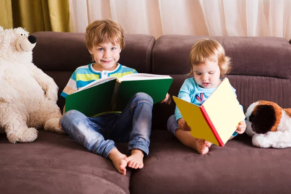 Cute Boy His Little Sister Reading Book Together Home Homeschooling — Stock Photo, Image