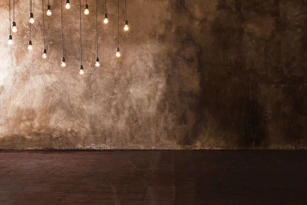 Decorative lamps on a grungy background of wall.