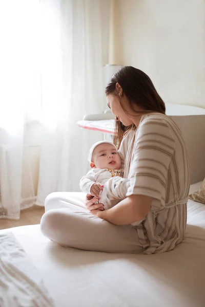 Happy Smiling Young Mother Playing Her Newborn Baby Bedroom Parenthood — Stock Photo, Image