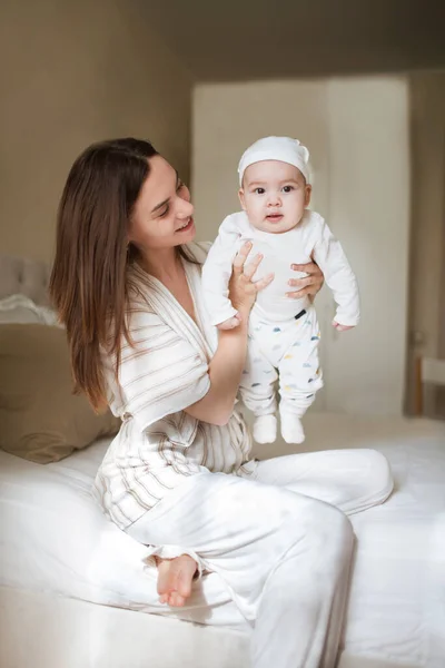 Happy Smiling Young Mother Playing Her Newborn Baby Bedroom Parenthood — Stock Photo, Image