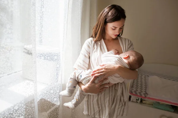 Happy Smiling Young Mother Playing Her Newborn Baby Bedroom Parenthood — Stock Photo, Image