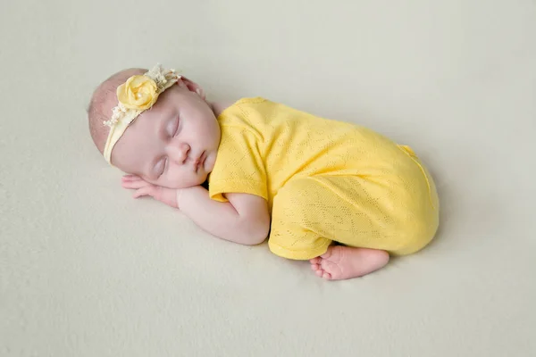 Beautiful Newborn Girl Yellow Suit Sleeps — Stock Photo, Image