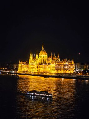 Aerial View of Hungarian Parliament Building Illuminated at Night in Budapest, Hungary