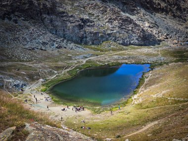 Aerial View of Riffelsee Alpine Lake with Visitors in Zermatt, Switzerland