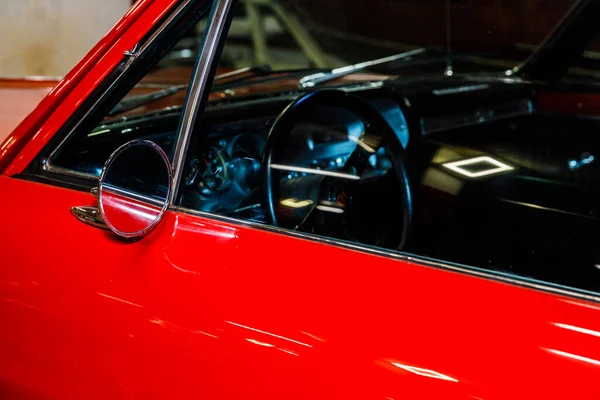 beautiful retro car of red color. close-up