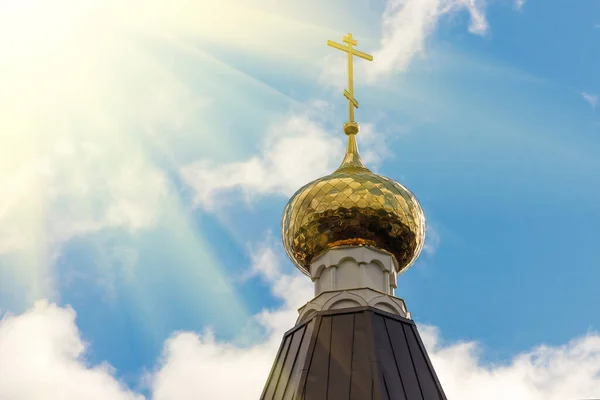 Orthodox church on a background of blue sky with clouds. High quality photo