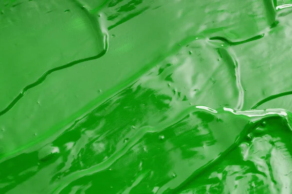 green oil paint. background for designer