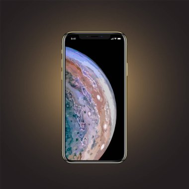 Bakü, Azerbaycan - 12 Eylül 2018: iphone X S üzerinde altın arka plan izole